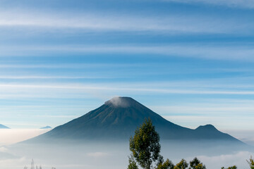 view of the sindoro mountains with a sea of ​​clouds