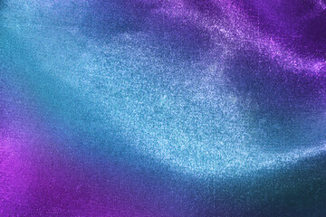 Purple and blue shiny fabric background