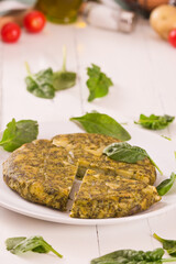 Spanish omelette with spinach.
