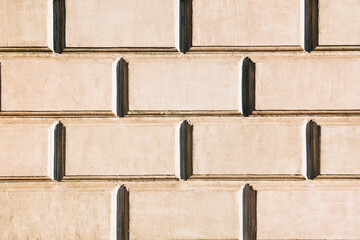 Texture, beige stone blocks, facade of  walls of an old building. Architectural background.