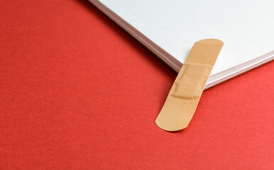 Medical plaster on notebook sheets.