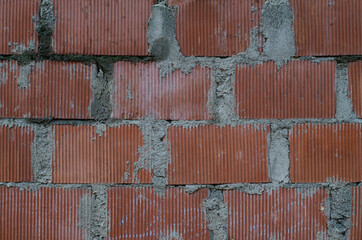 Brickwork. Red brick wall. The structure of the stone. Cement surface.