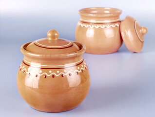 two pots ceramic purple background