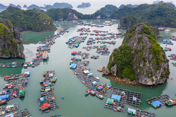 Aerial view of Floating fishing village in Lan Ha Bay, Vietnam. UNESCO World Heritage Site. Near Ha Long bay © Eric Isselée