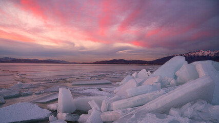 Winter landscape sunset with broken piles of ice in Utah