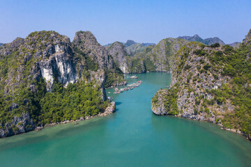 Aerial view of Floating fishing village in Lan Ha Bay, Vietnam. UNESCO World Heritage Site. Near Ha...