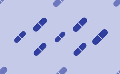 Seamless pattern of large isolated blue medical capsule symbols. The pattern is divided by a line of elements of lighter tones. Vector illustration on light blue background
