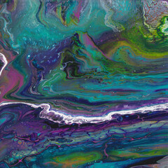 Abstract marbled fluid painting, poured acrylic paint in purple, blues and greens