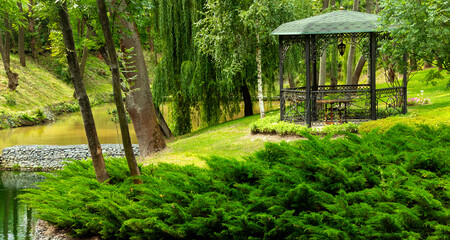 Gazebo in a park in spring.