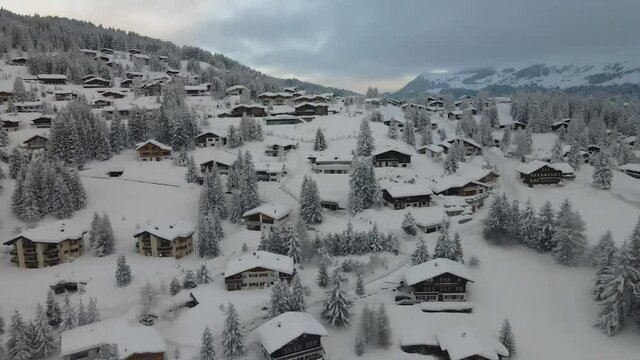 Snow covered village and mountains
