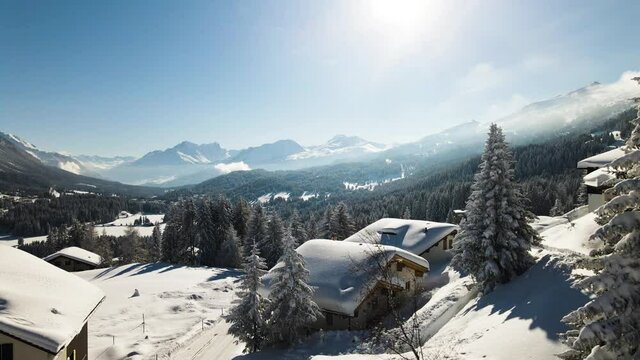 Snow covered cabin in the alps during winter