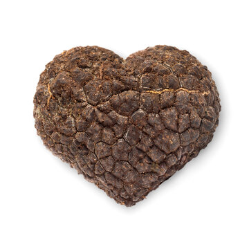  Heart shaped fresh black truffle isolated on white background