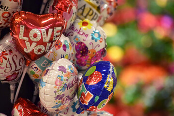 Valentine and Other Holiday or Celebration Balloons on Display in a Grocery Store