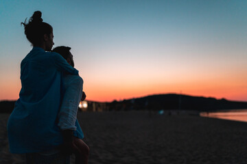 Couple inlove at beach with sunset