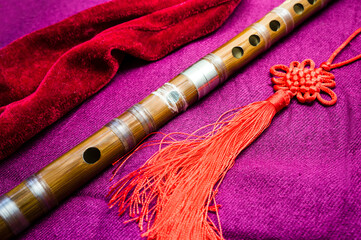 Chinese bamboo dizi flute with decoration and case. © В. Дресвянников