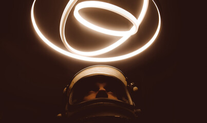 Cinematic abstract concept of an astronaut with ring lights © oneinchpunch