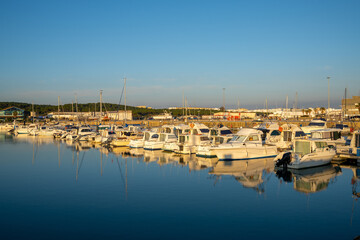Fototapeta premium view of the marina and harbor in Barbate at sunset