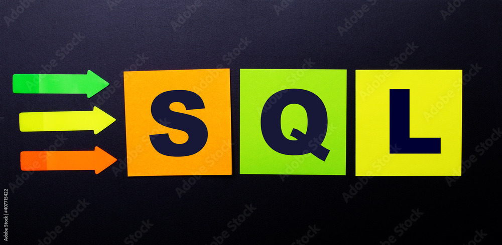 Poster bright multi-colored paper stickers on a black background with the text sql