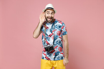 Curious traveler tourist man in summer clothes hat photo camera try to hear you overhear listening...