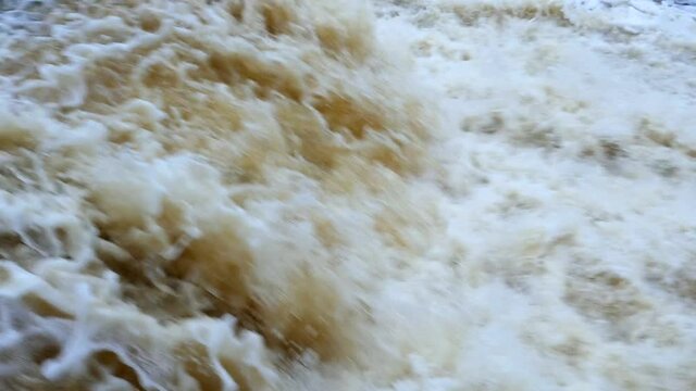 waterfall stream of seething white water nearby