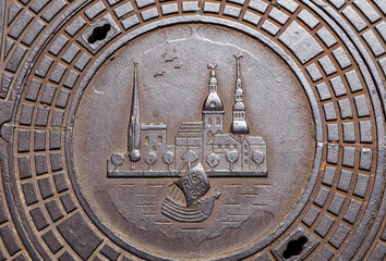 Riga Metal Manhole cover with bas relief of city landmarks