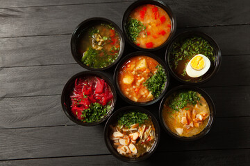 Business lunch in eco plastic container ready for delivery.Top view. Office Lunch boxes with food ready to go. Food takes away. Catering, brakfast