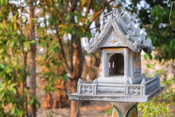Old white shrine in the house or guardian spirit to worship and protect the area around the house...