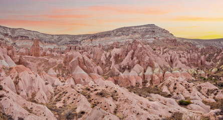 Sunset view from Aktepe Hill over Red valley in Cappadocia, Anatolia, Turkey. Goreme National Park..
