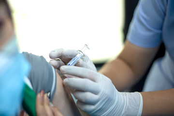 Covid vacine injection by doctor at hospital