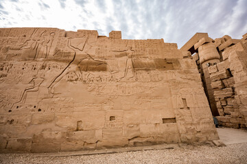 Egyptian wall writings and hieroglyphics in the Karnak Temple Complex in Luxor. A famous ancient...