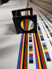 Prepress color control in printing house. Selective focus.