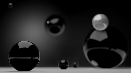 A shinning black pearl on white floor with blur back and white pearl in background (3D Rendering)