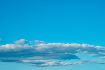 Blue sky background with clouds