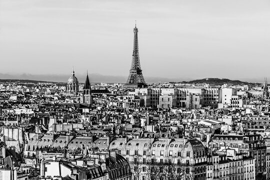 Famous Paris skyline with the Eiffel Tower as seen from the top of the Notre Dame Cathedral. Cityscape of Paris, France