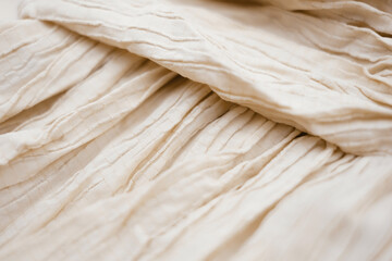 Fototapeta premium Abstract fashion background with pastel beige fabric