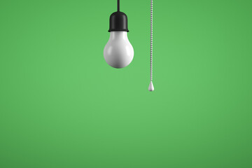 Green energy theme. Turned off light bulb on a green background