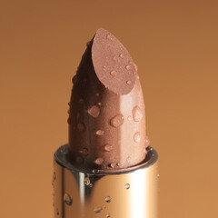 Closeup shot of a brown lipstick isolated on white background