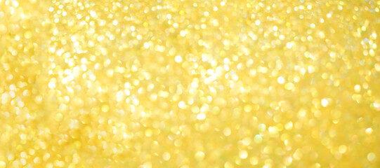 Festive yellow background with sequins and rhinestones