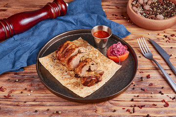 Grilled lamb, wooden background