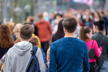 Crowd of people on the street. Summer day