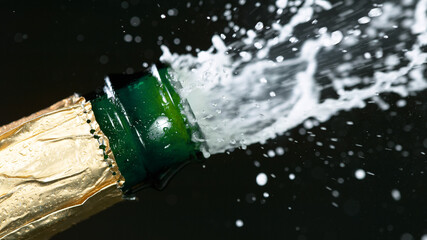 Opening a bottle of champagne.
