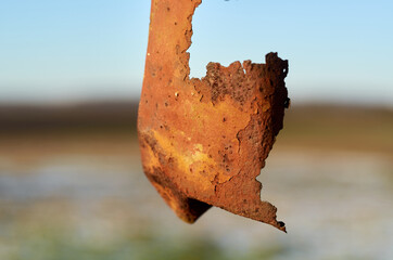 Old rusty metal against sky background