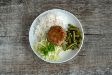 food meatballs cabbage on the table beans pods