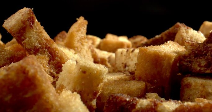 Golden brown, crispy hunks of bread are crunchy on the outside and slightly chewy on the inside, generously saturated with a cheezy coating, customizably garlicky. High quality.