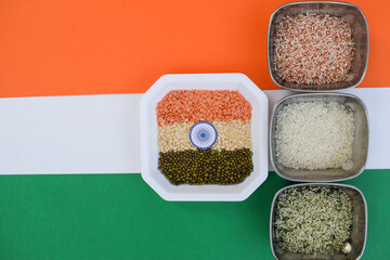 Three colors of rice resembling Indian tri coloured India flag with ashok chakra. 