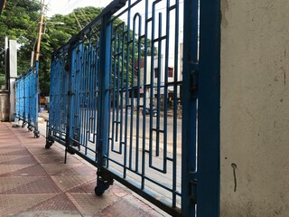Oil painted Blue color Manual operated sliding door for front gate entrance of an residential complex