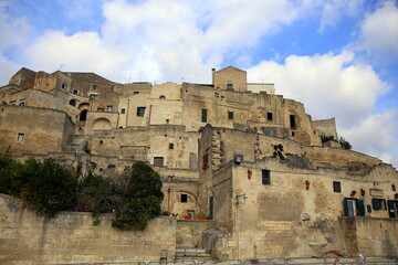 Fototapeta premium View under a blue sky of the Sasso Caveoso buildings of Matera, European Capital of Culture 2019