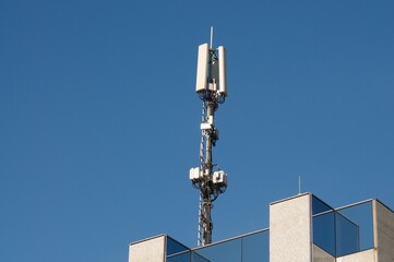 Telecommunication antenna of 4G and 5G network on a building in Switzerland