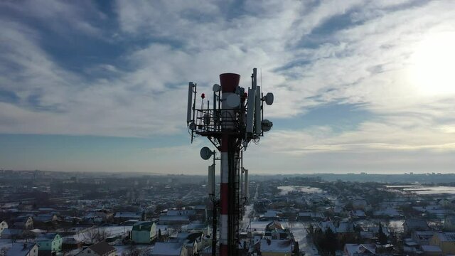 Telecommunication tower of 4G and 5G cellular. Base Station or Base Transceiver Station. Wireless Communication Antenna Transmitter. Telecommunication tower with antennas against blue sky.