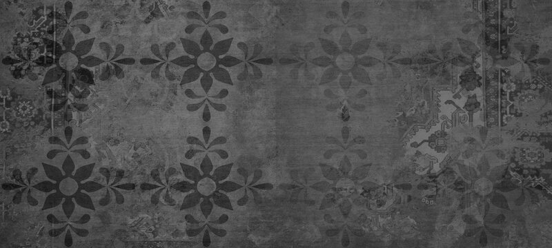 Old gray grey anthracite black vintage worn shabby patchwork floral flower leaves motif tiles stone concrete cement wall texture background banner